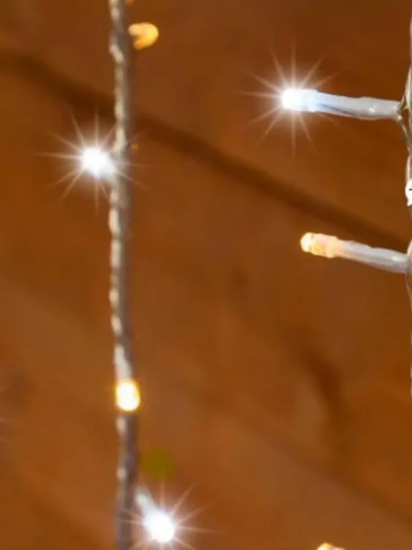 Bombillo_Cortina_1330B Fotografía de bombillo de luces led cálido