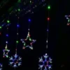 Imagen de la cortina de luces led estrellas y copos