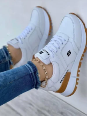 Skecher_Blanco Imagen modelo calzado deportivo