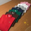Fotografía camisetas tipo LaCoste de diversos colores